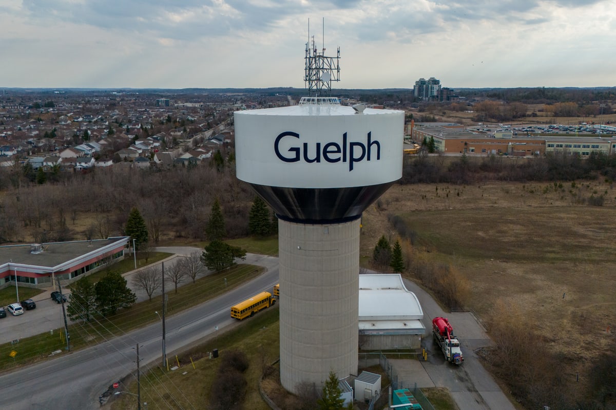 An aerial view of the Guelph water tower with the surrounding streets and school field